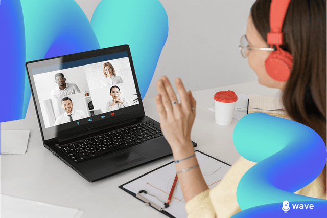 A woman taking notes of a meeting on her laptop