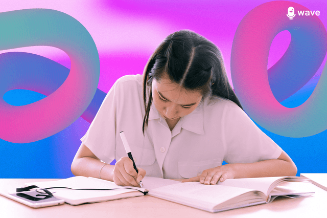 A young woman taking biology notes at a pink desk