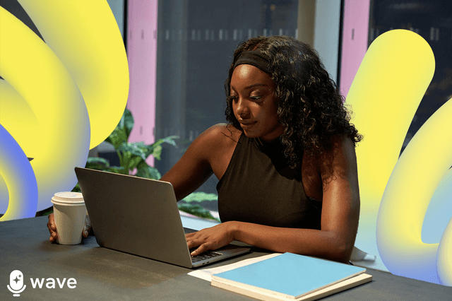 A professional woman recording a Webex meeting on her laptop